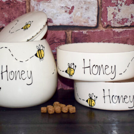 Dog bowls and a treat jar